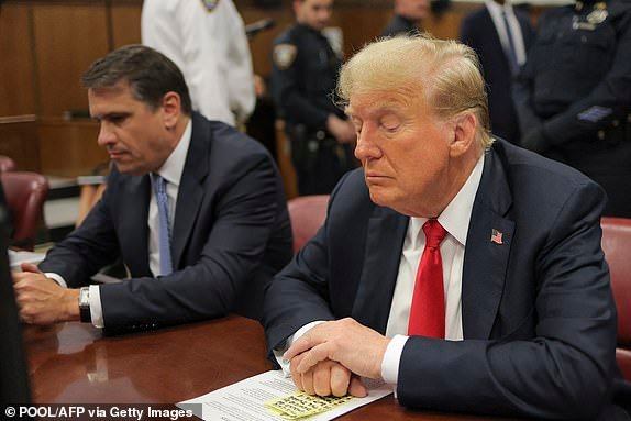 Former US President and Republican presidential candidate Donald Trump sits in court during his trial for allegedly covering up hush money payments at Manhattan Criminal Court in New York City, on May 28, 2024. Donald Trump arrived Tuesday for closing arguments in his New York hush money trial ahead of the jury deciding whether to make him the first criminally convicted former president and current White House hopeful in history. (Photo by Andrew Kelly / POOL / AFP) (Photo by ANDREW KELLY/POOL/AFP via Getty Images)