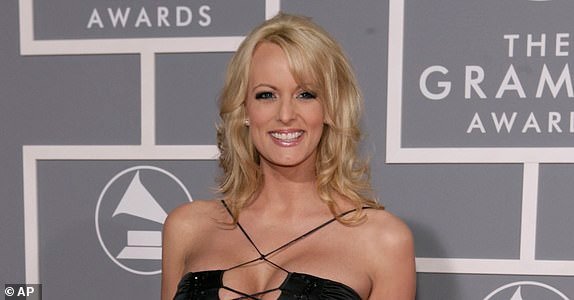 FILE - In this Feb. 11, 2007, file photo, adult film actress Stormy Daniels arrives for the 49th Annual Grammy Awards in Los Angeles. New documents show a top lawyer for the Trump Organization was involved in legal efforts to keep adult film star Daniels from talking about her alleged affair with President Donald Trump. The arbitration documents are signed by Trump Organization lawyer Jill A. Martin and list her address as that of Trump's golf club in Los Angeles. (AP Photo/Matt Sayles, File)