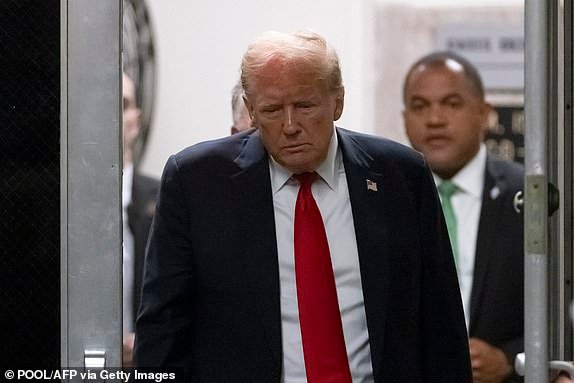 Former US President and Republican presidential candidate Donald Trump returns from a break as closing arguments continue in his criminal trial for allegedly covering up hush money payments at Manhattan Criminal Court in New York City, on May 28, 2024. Donald Trump engaged in 