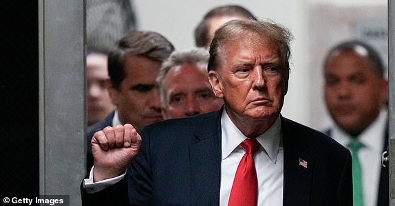 NEW YORK, NEW YORK - MAY 28:  Former U.S. President Donald Trump gestures while returning from a break during his hush money trial at Manhattan Criminal Court on May 28, 2024 in New York City. Closing arguments are set to begin in former U.S. President Trump's hush money trial. The former president faces 34 felony counts of falsifying business records in the first of his criminal cases to go to trial. (Photo by Julia Nikhinson-Pool/Getty Images)
