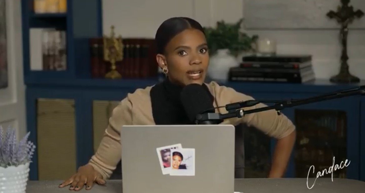 Candace Owens discussing a topic on her podcast, seated at a desk with a microphone and laptop, in a well-decorated room.