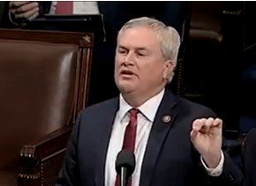 Congressman speaking passionately during a session in the House of Representatives, emphasizing key points with hand gestures.