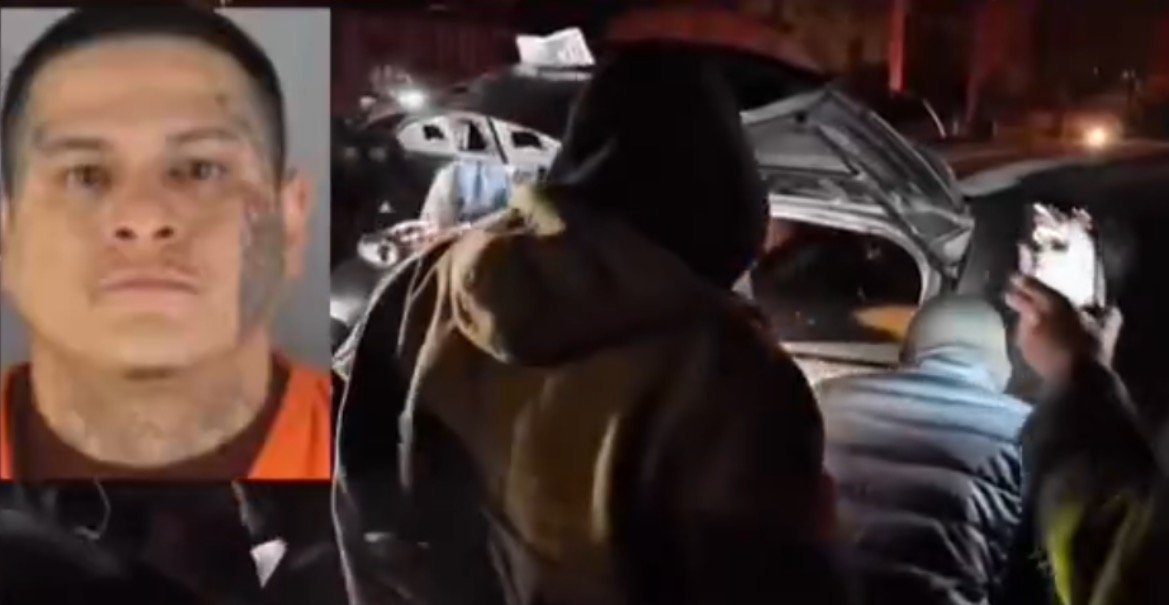 Scene depicting a police investigation with several individuals gathered around a vehicle at night, highlighting an ongoing law enforcement operation.