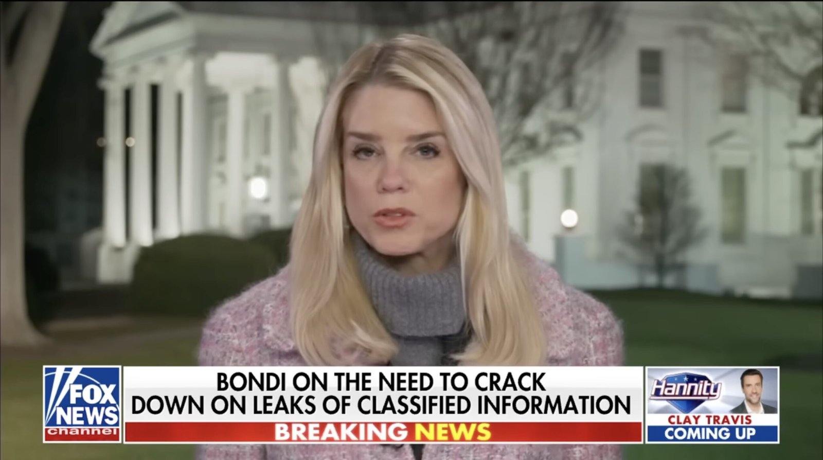 Breaking news segment featuring a female commentator discussing the importance of addressing leaks of classified information outside the White House.