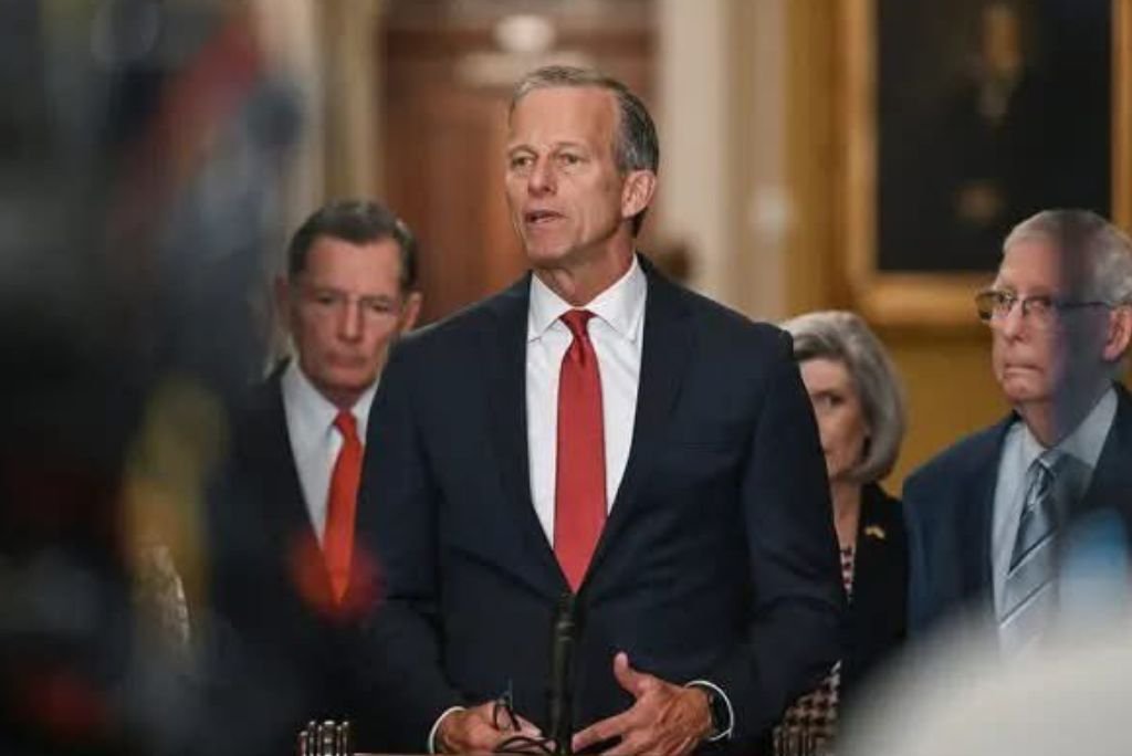 John Thune speaks at a press conference in the U.S. Capitol, flanked by fellow lawmakers, discussing key legislative issues.